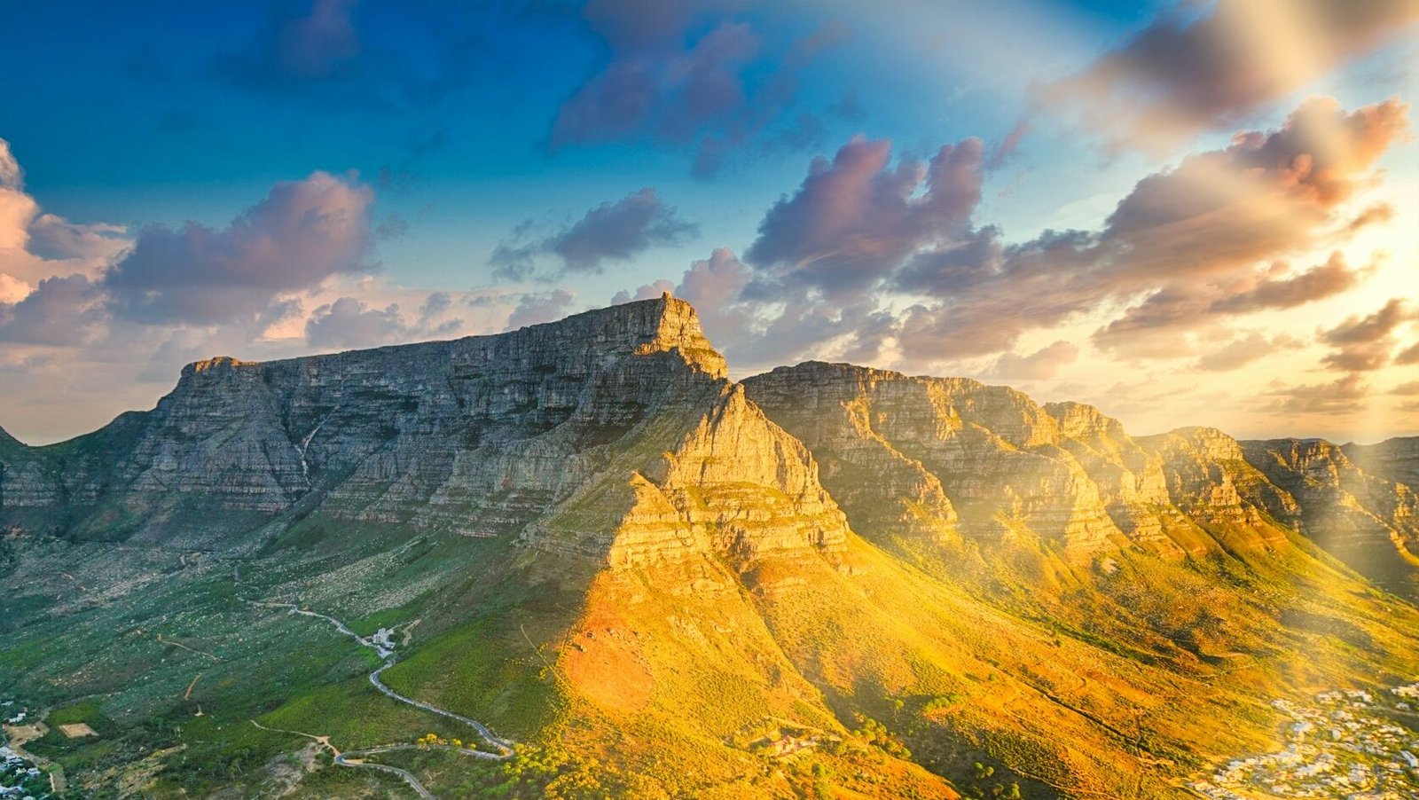 brown rocky mountain under blue sky during daytime